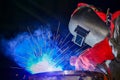 IndustryÃ¢â¬â¹ WorkerÃ¢â¬â¹ weldingÃ¢â¬â¹ steelÃ¢â¬â¹ pipeÃ¢â¬â¹ withÃ¢â¬â¹ sparksÃ¢â¬â¹ lightÃ¢â¬â¹ inÃ¢â¬â¹ factoryÃ¢â¬â¹ onÃ¢â¬â¹ blackÃ¢â¬â¹ backgroundÃ¢â¬â¹